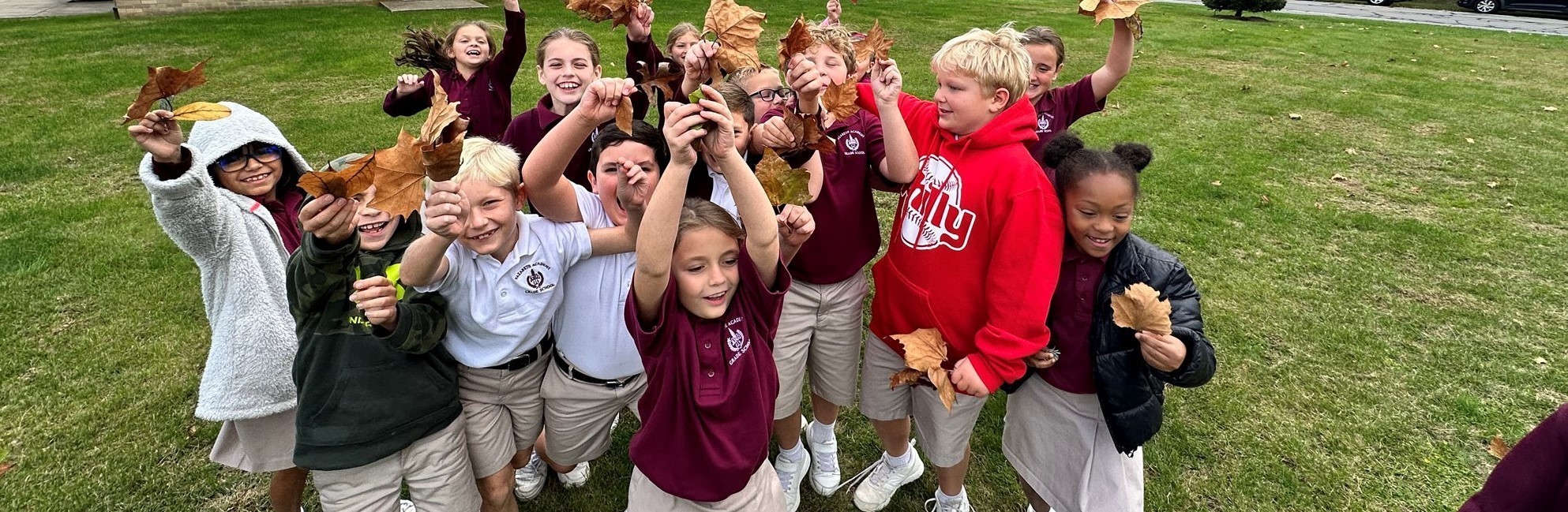 Students collecting leaves